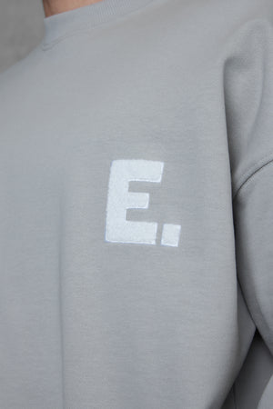 GREY E. STATEMENT OVERSIZED SWEATER